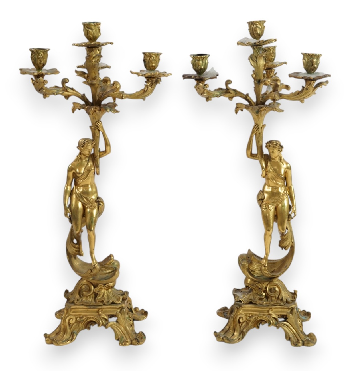 A pair of 19th century French ormolu five light ‘Venus’ figural candelabra